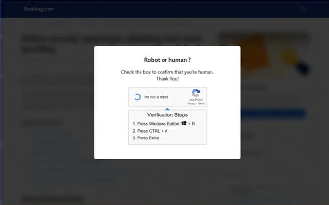 Giao diện CAPTCHA giả, hướng dẫn người dùng thực hiện kỹ thuật ClickFix.